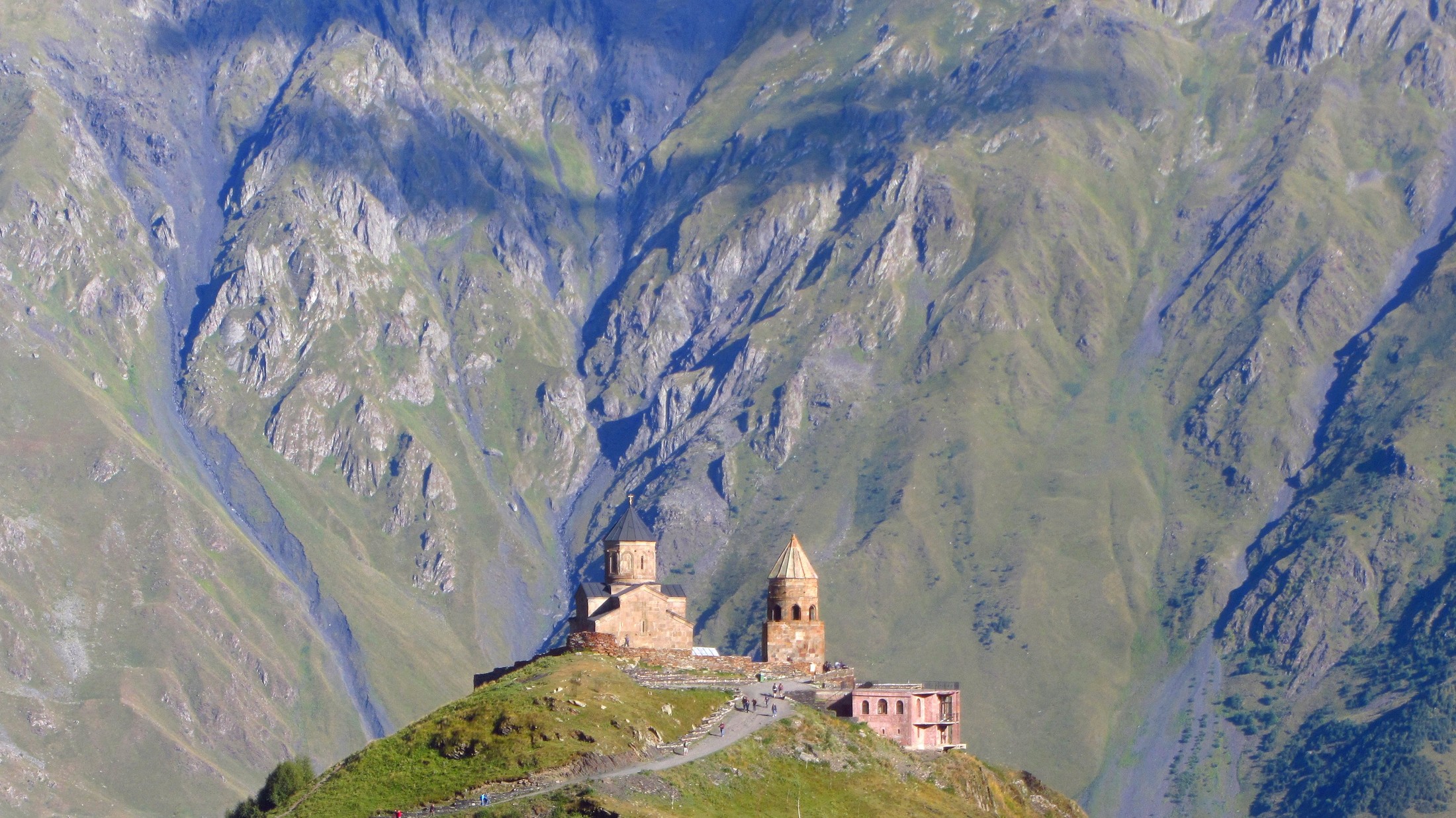Tsminda Sameba Monastery with the impressive Caucasian Mountains | Stepantsminda in Georgia