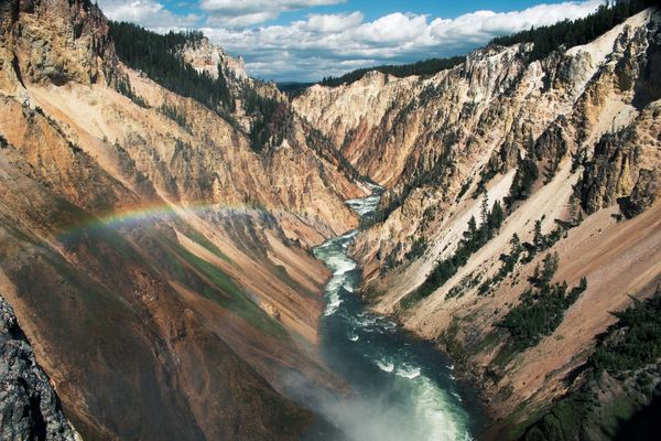 Aerial photo of mountain and river | Yellowstone National Park in United States