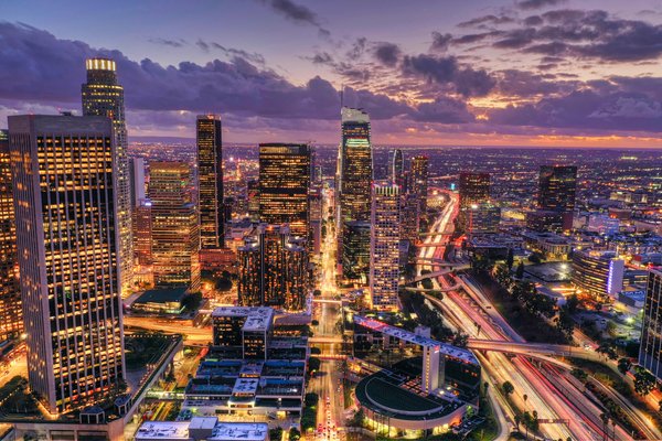 Aerial view of a city at sunset lit up | Los Angeles in United States